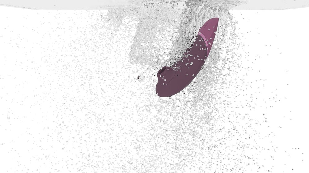 Womanizer NEXT · tlakový stimulátor klitorisu s 3D Pleasure Air · tmavě fialová