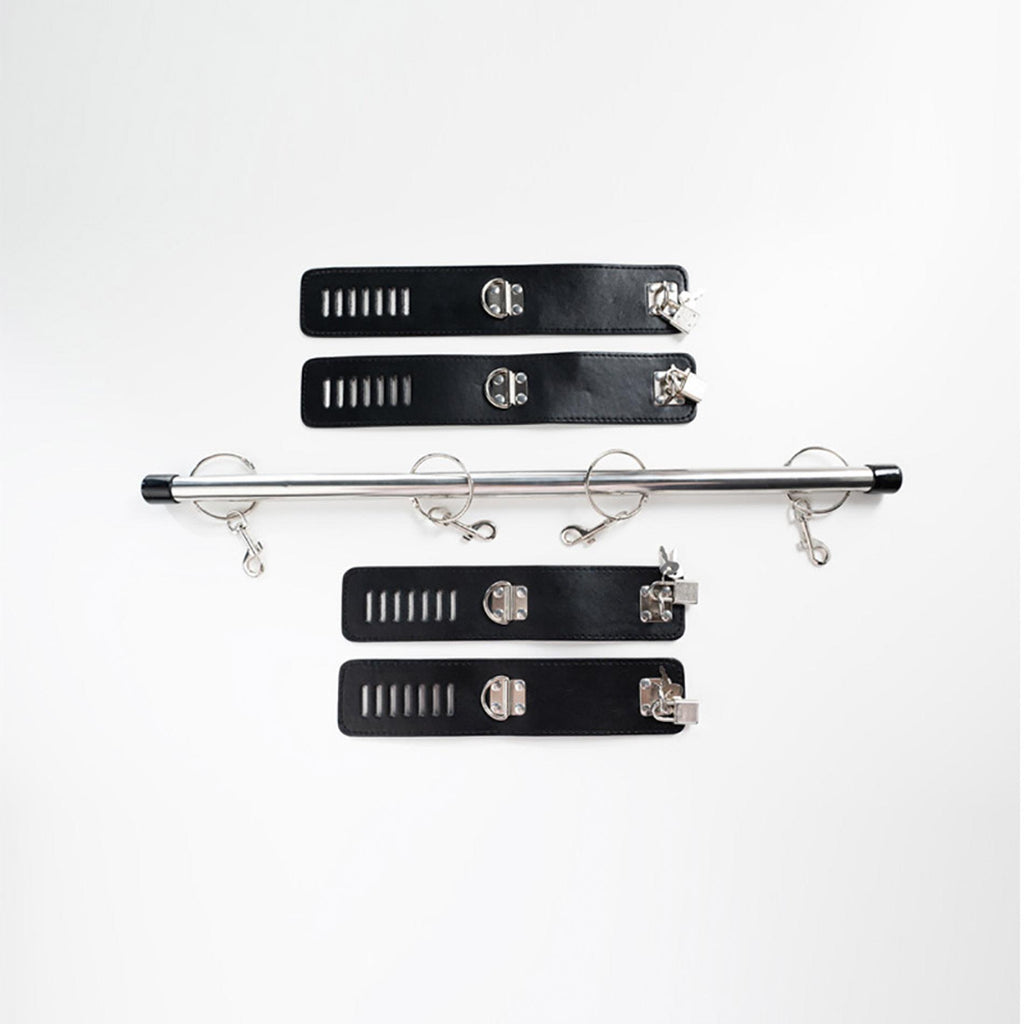 Spreader bar with wrist and ankle cuffs